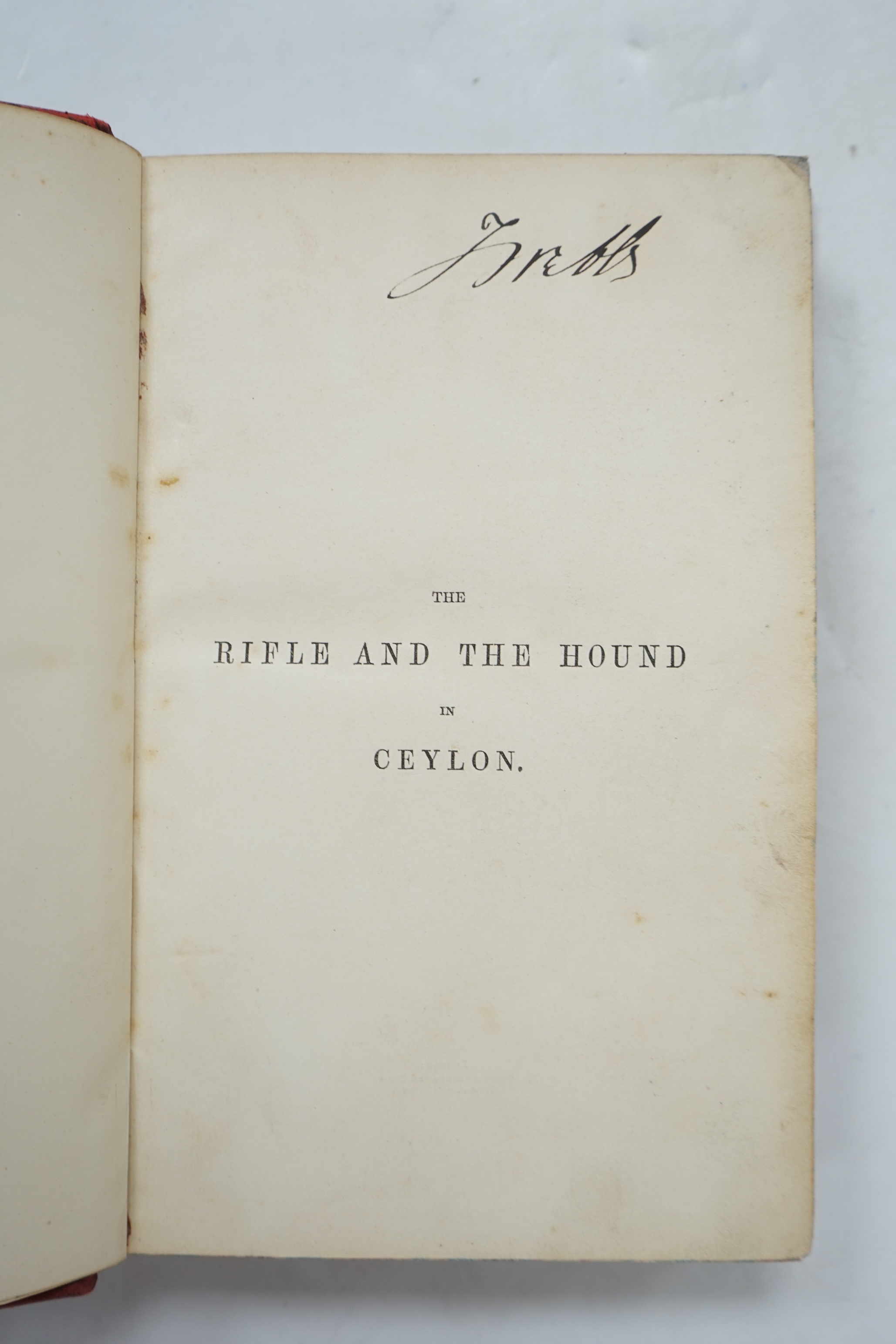 Baker, Sir Samuel White - The Rifle And The Hound in Ceylon, 1st edition. 6 chromolithographed plates. inc. frontis., few wood eng. illus., contemp. red half calf gilt, 8vo., Longman, Brown, Green and Longmans. 1854.